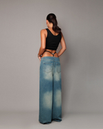 Джинсы бананы