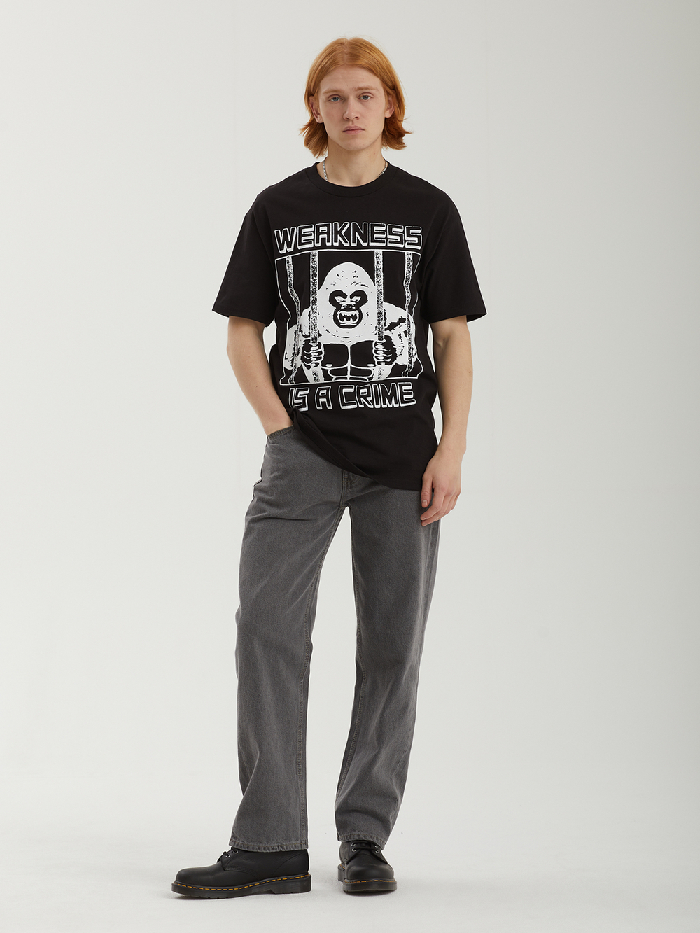 Мужская Футболка Weakness Is A Crime