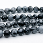 Обсидиан "Снежный" бусины (сорт Б), диаметр 8-8,2 мм, цена за нить 38 см