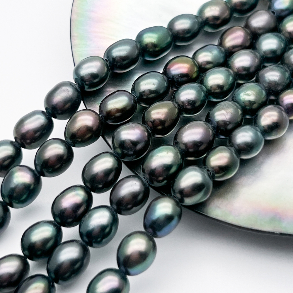 Жемчуг бусины, цвет черный AB, размер около 6-7,5*6-6,5 мм, цена за отрезок 18 см (1/2 нити)