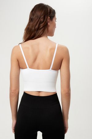 Топ бесшовный на бретелях в рубчик удлиненный