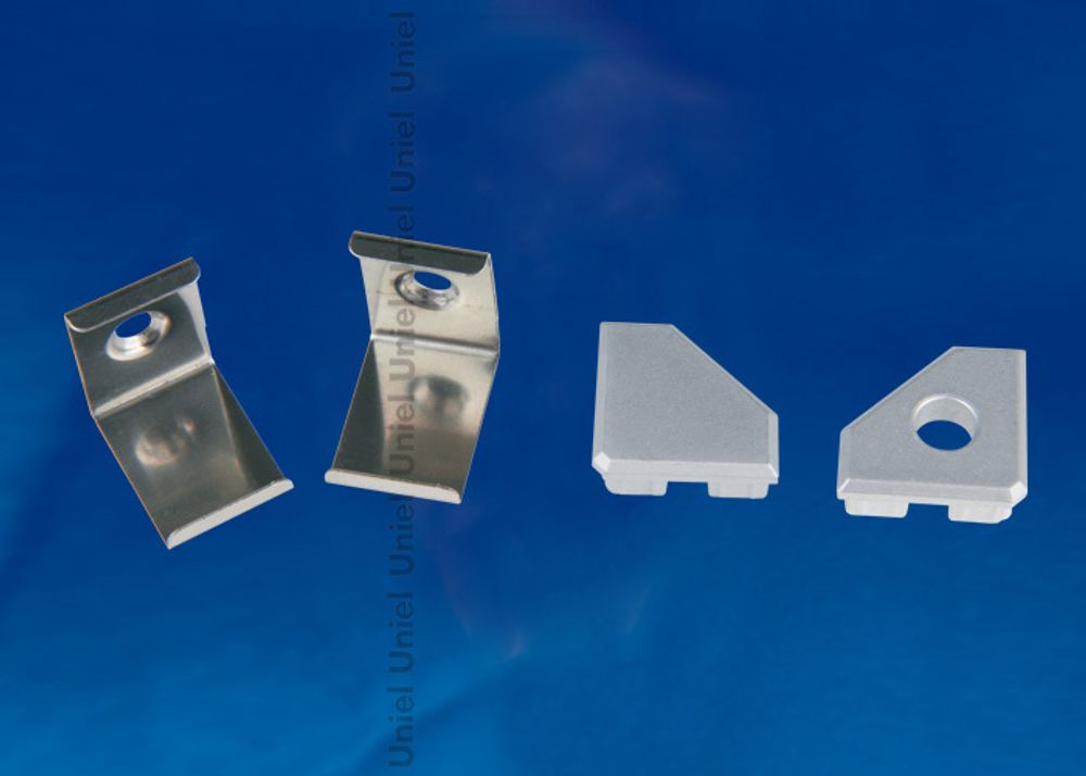 UFE-N03 SILVER A POLYBAG Набор аксессуаров для алюминиевого профиля. Крепежные скобы (4 шт., сталь) и заглушки (4 шт., пластик). Цвет серебро. ТМ Unie