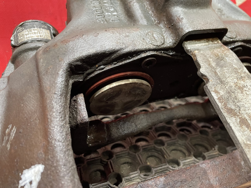 Суппорт задний левый