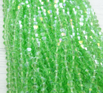 ББ020ДС3 Хрустальные бусины "биконус", цвет: св-зеленый AB прозр., размер 3 мм, кол-во: 95-100 шт.