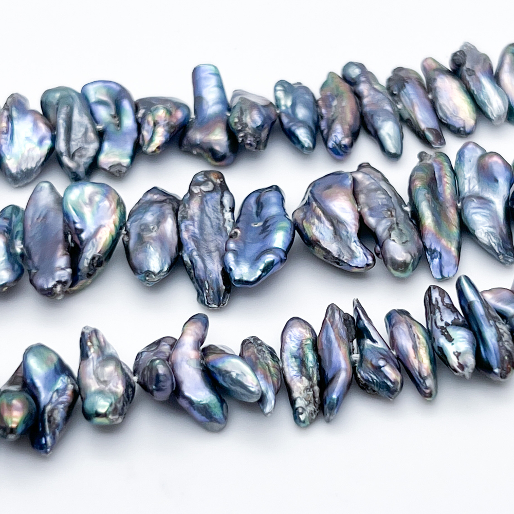 Жемчуг, размер около 12-20*5-8 мм, цена за отрезок 18 см (1/2 нити)