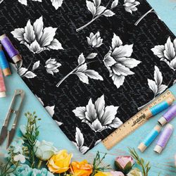 Ткань атлас скульптура цветов на чёрном фоне с надписями