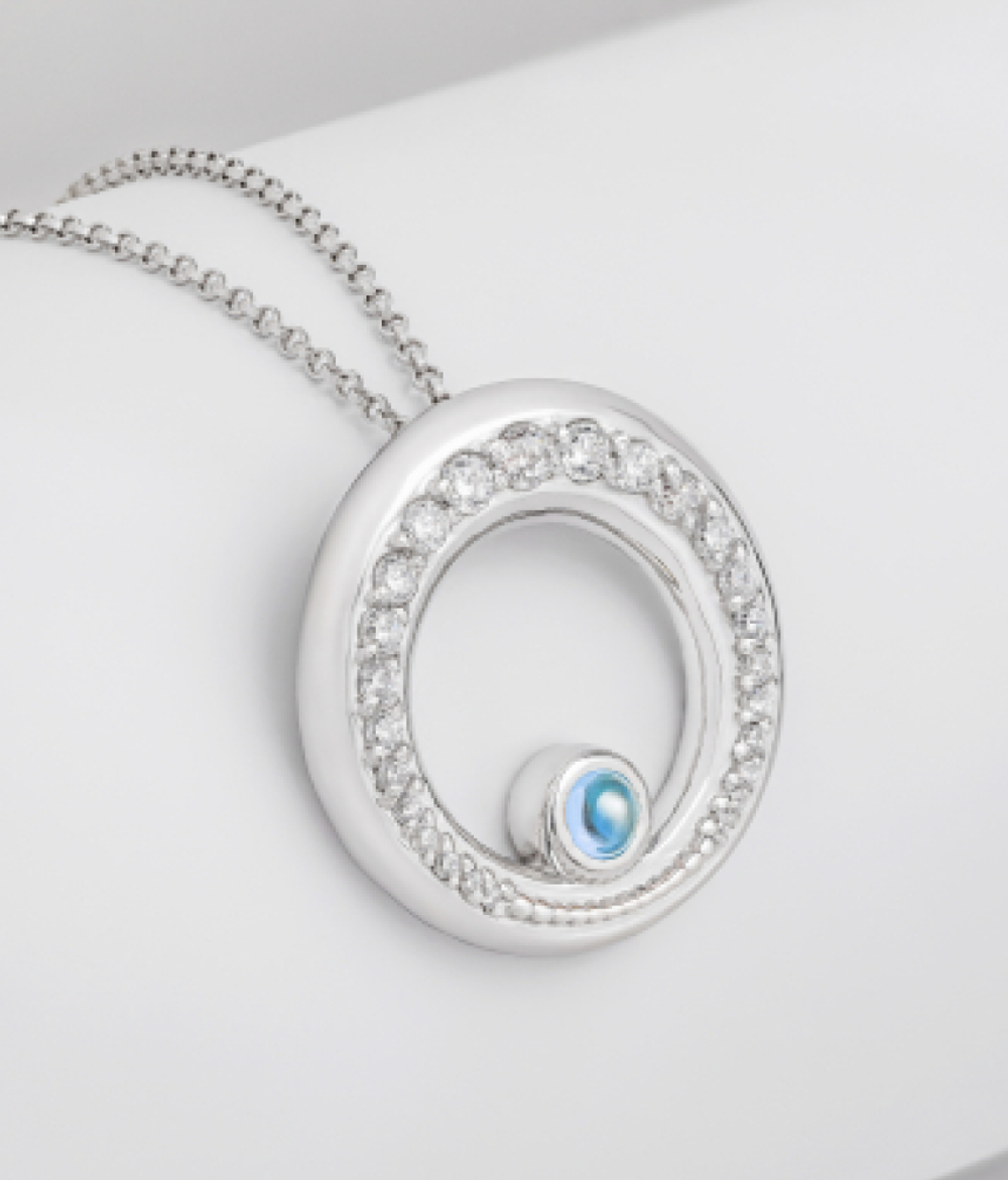 Подвес большой из серебра со вставками из топаза и бесцветных фианитов