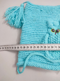 Шапка с кисточками