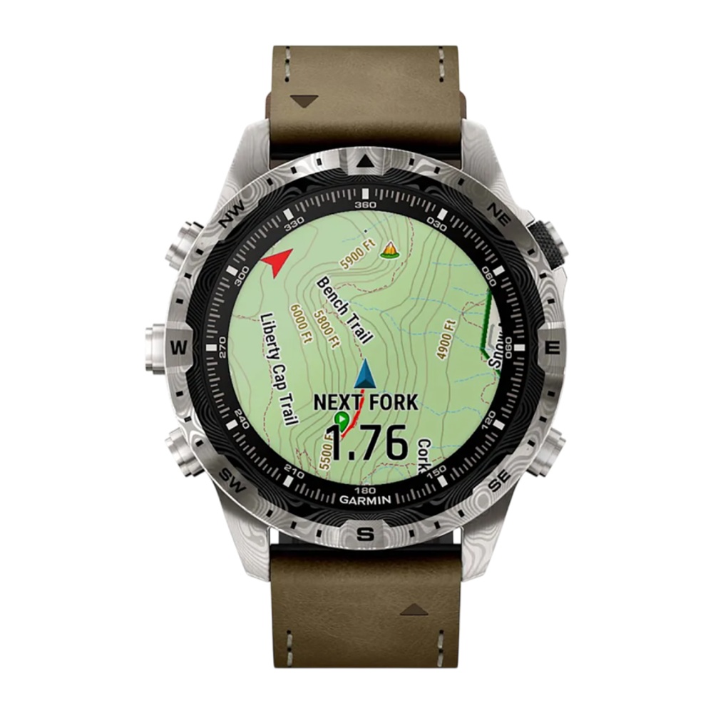 Спортивные часы Garmin MARQ Adventurer (Gen 2) Damascus Steel Edition, гибридный ремешок, чёрный силиконовый ремешок Безель и корпус из дамасской стали, AMOLED-дисплей с куполообразным сапфировым стеклом. Ремешок из кожи и фторэластомера и силиконовый рем