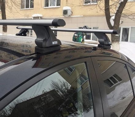 Багажник Интер Спектр на Mazda 2 2007-2014 в штатные места 8894 аэродинамические дуги 120 см.