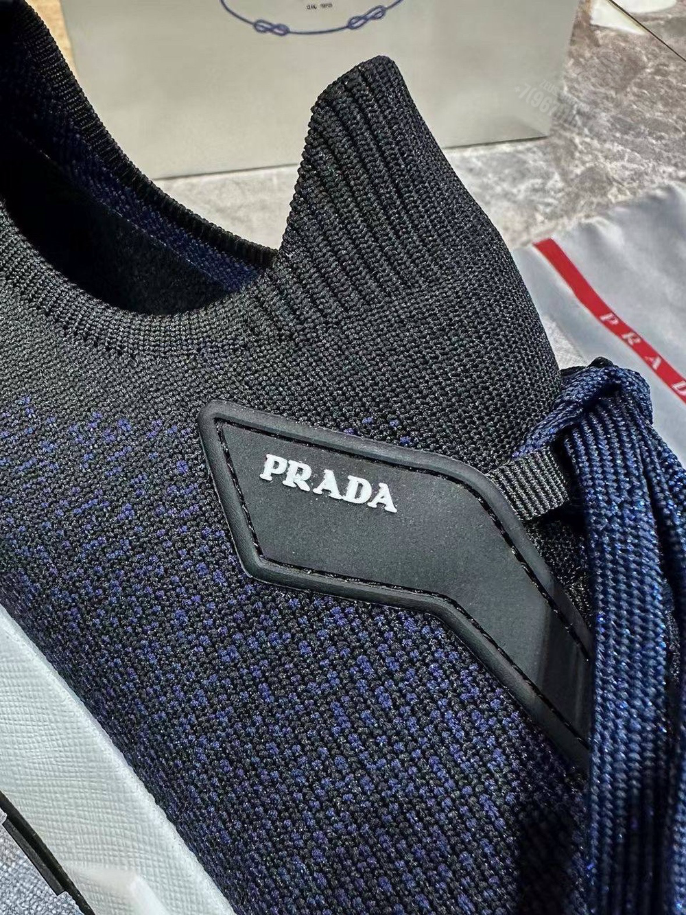 Кроссовки Prada