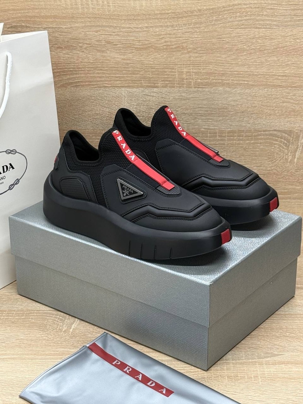 Кроссовки Prada