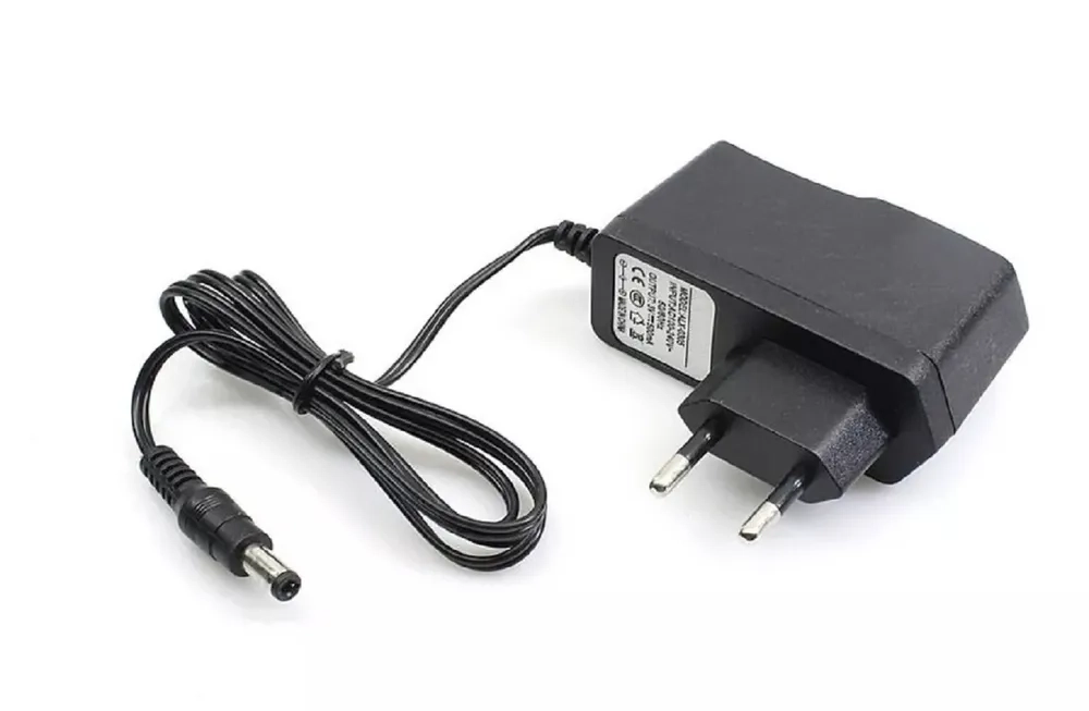 Блок питания (сетевой адаптер) универсальный 7.5V/1A (5,5*2,5 мм)