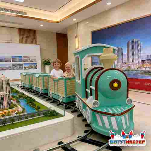 Рельсовый аттракцион для детей «Бирюзовый мечтатель», 4 кабинки 7 мест