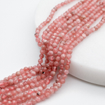 Родохрозит граненый, диаметр около 3-3,2 мм, цена за отрезок 19 см (1/2 нити)
