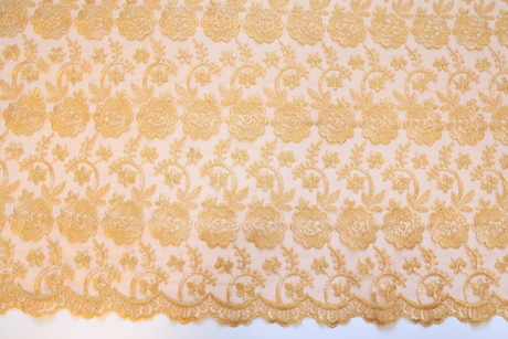 Вышивка на сетке бежевая