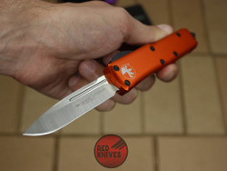 Нож Microtech UTX-85 S/E - оранжевая рукоять, стандартный клинок, сатин + запчасти RK-393