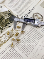 Пуговицы прозрачные золотистые "Ласточка"