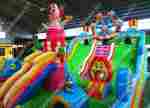 Коммерческий надувной батут «Парк развлечений Мульти» 15*8*8 м