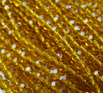 БП005НН34 Хрустальные бусины "рондель", цвет: янтарный прозрачный, размер 3х4 мм, кол-во: 95-100 шт.