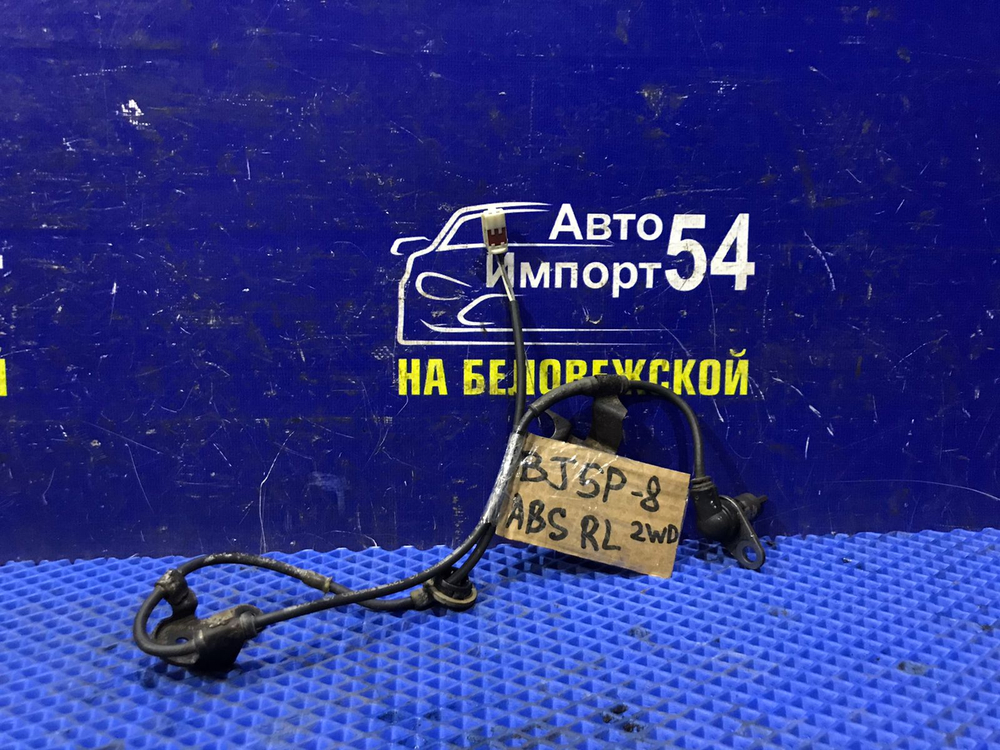 Датчик ABS задний левый MAZDA FAMILIA 2003