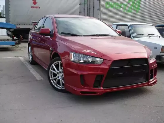 Бампер передний EXTREME для Mitsubishi Lancer 10
