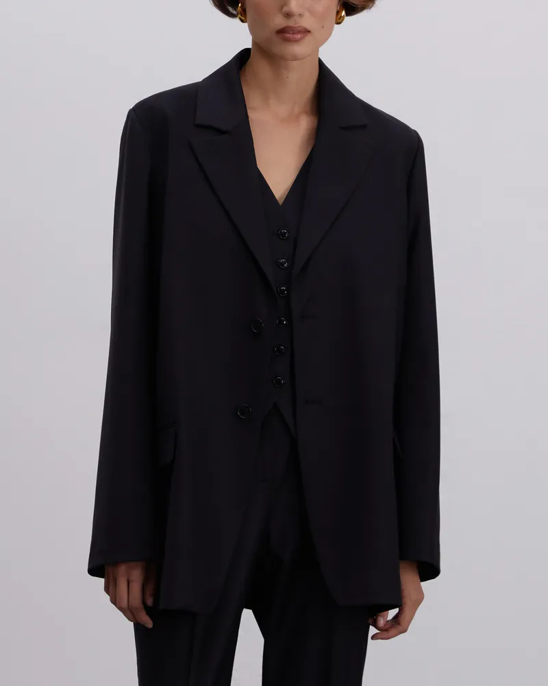 Черный шерстяной жакет с карманами