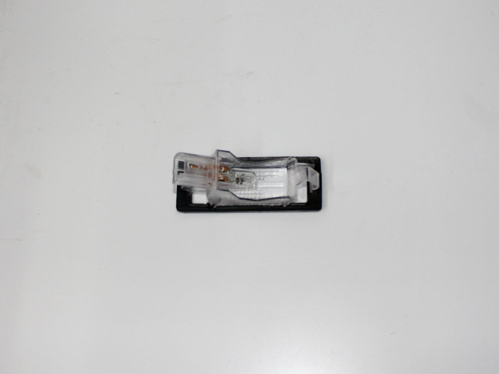 Фонарь подсветки номерного знака 15A387009B TYC для Renault