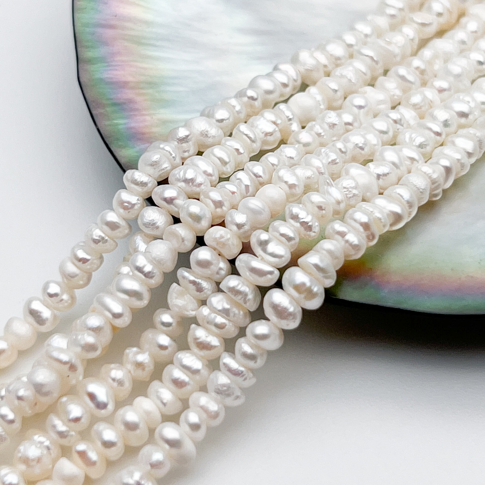 Жемчуг, размер около 2,5*4 мм, цена за нить 35 см