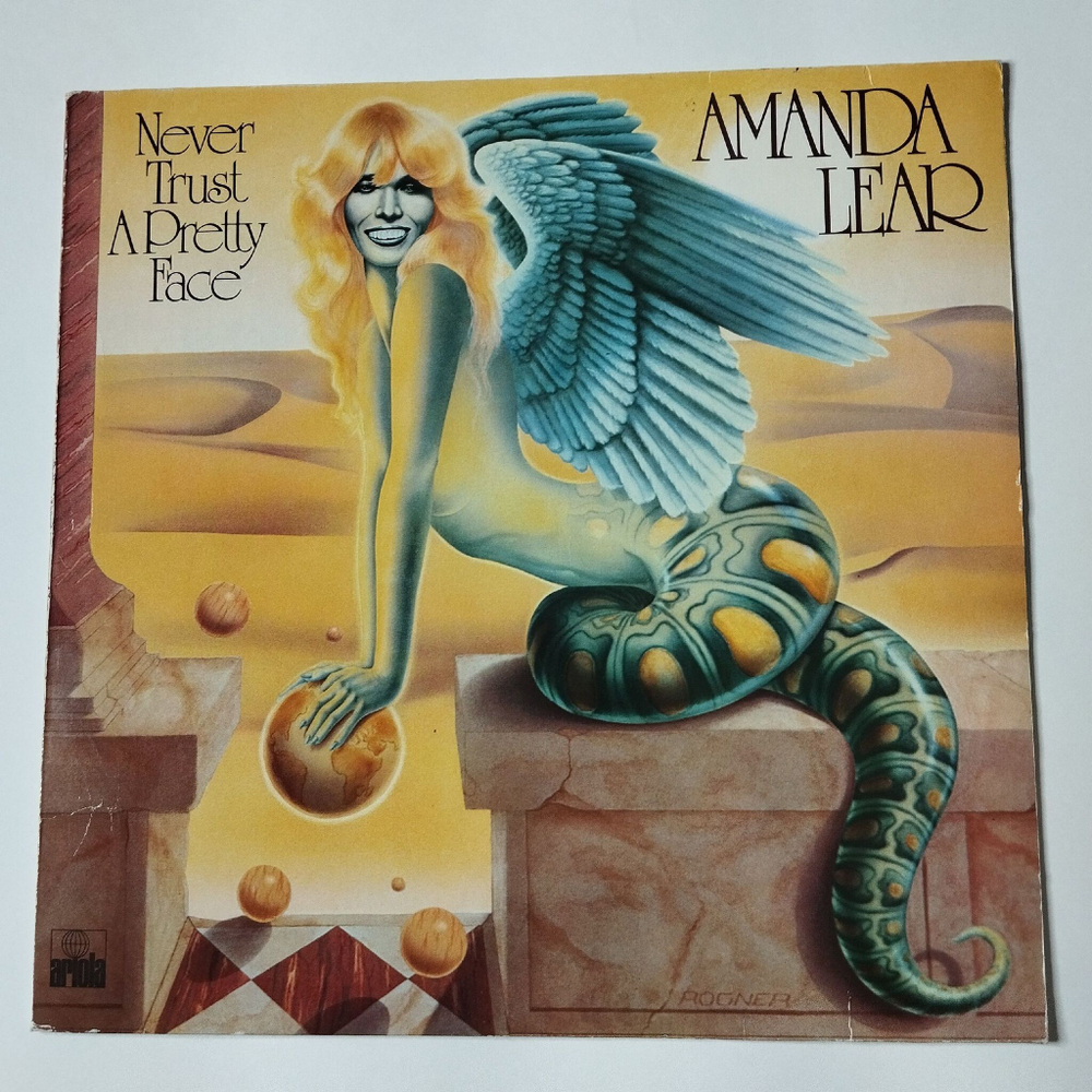 Винтажная виниловая пластинка LP Amanda Lear Never Trust A Pretty Face (Germany 1979) Black Holes
