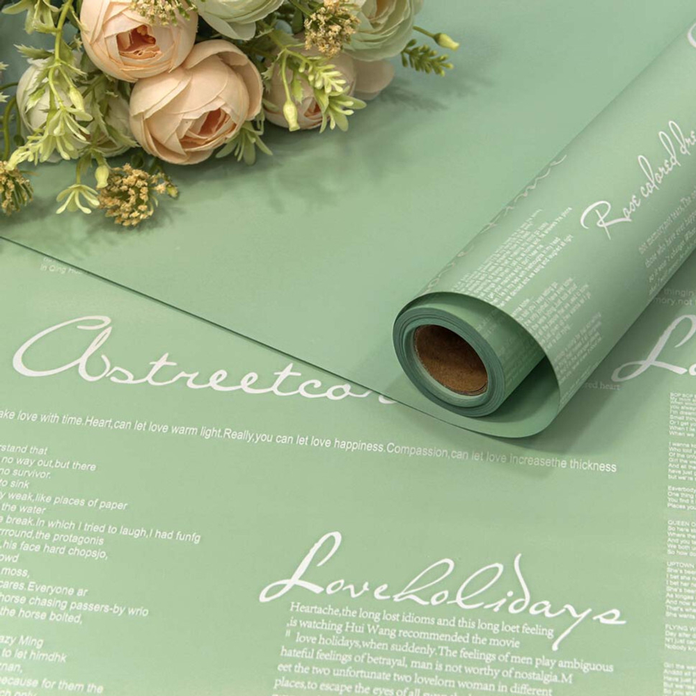 Пленка В рулоне 10 м х 58 см двухсторонняя с надписями (Зеленый)