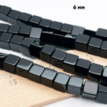 Халцедон тонированный черный бусины, куб, размер около 6,2 мм, цена за 15 шт (1/4 нити)