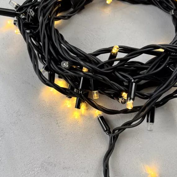 Светодиодная гирлянда Sealed с супер - мерцанием 10 м., 220V ., 75 теплых белых LED ламп, черный каучук, LTC (LL75ABL-1-2WW)