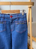 Джинсы Gucci, 140