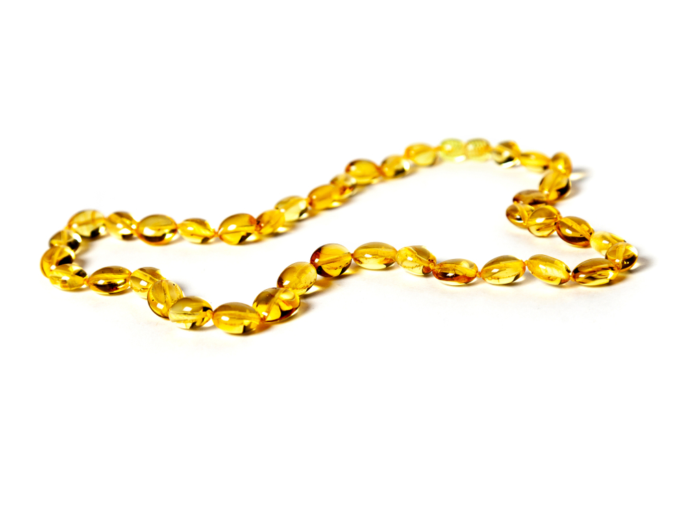 Бусы из янтаря натурального. Длина 45 см, бусины 8 на 5 мм. Янтарные бусы женские лечебные