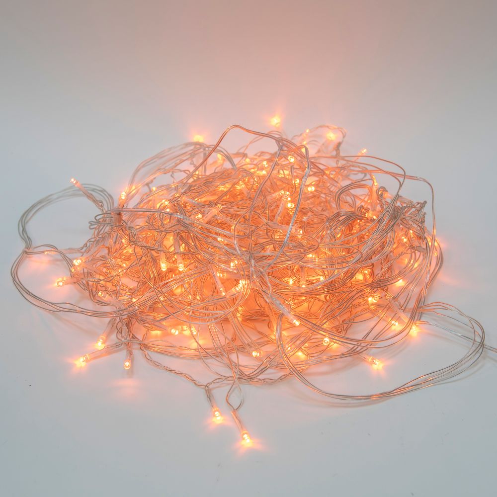 ULD-B12006-195-TTK AMBER IP44 Бахрома светодиодная с эффектом мерцания. 12м. Соединяемая. 195 светодиодов. Янтарный свет. Провод прозрачный. ТМ Uniel