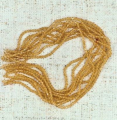 Бусины граненые Биконус стекло на леске, р. 4х4 мм, отверстие 1 мм, ~105 бусин*10 нитей, янтарный