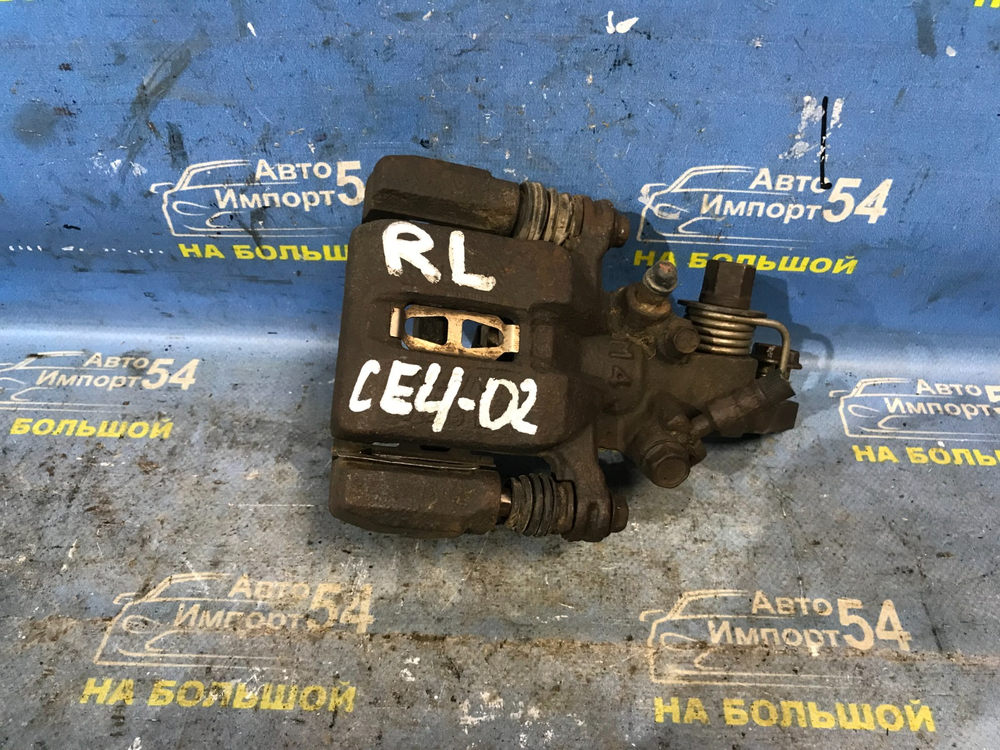 Суппорт тормозной задний левый Honda RAFAGA 1995