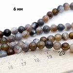 Агат, диаметр 6,2-6,3 мм, цена за 29-30 шт (1/2 нити)