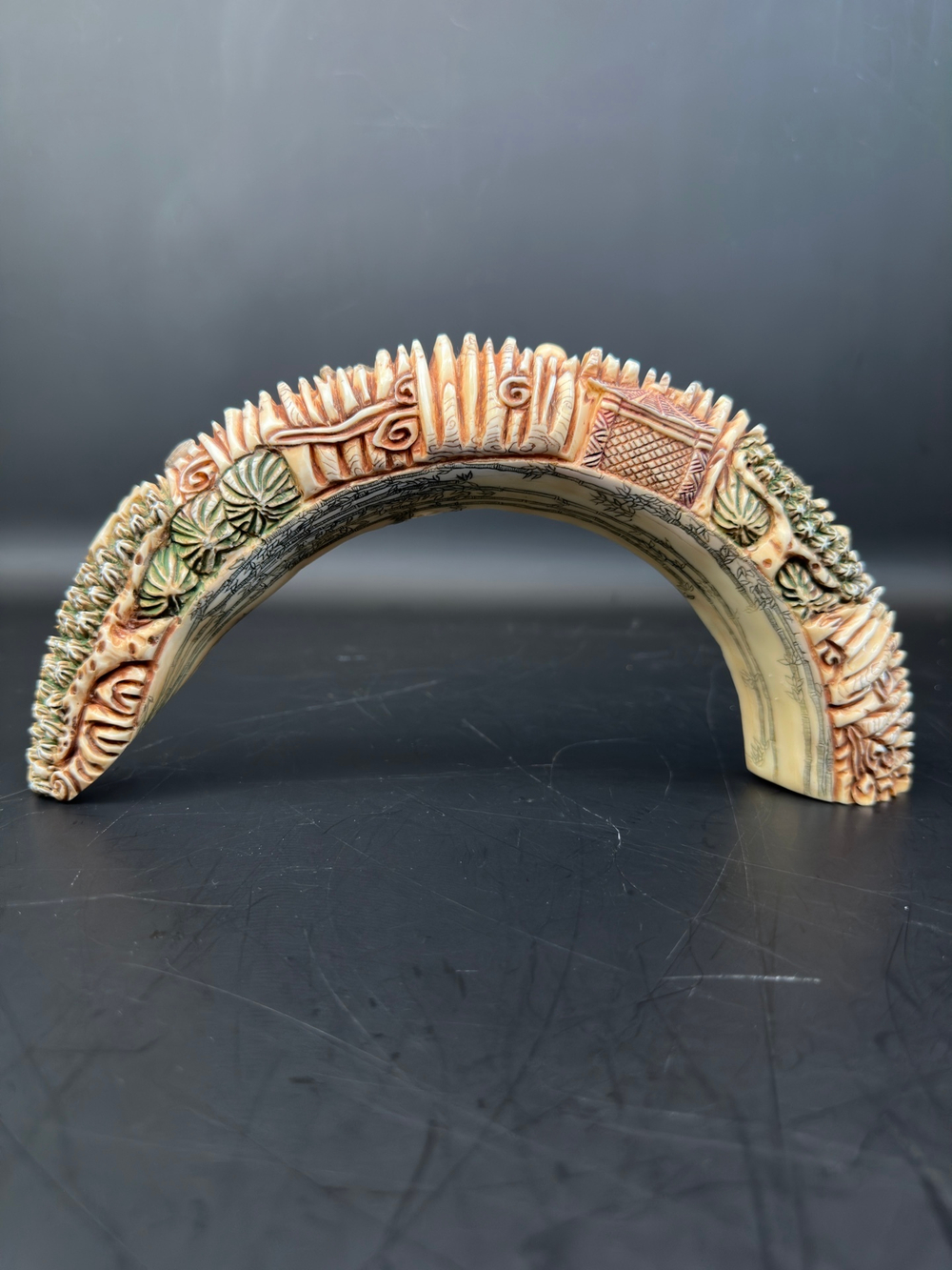 Резная композиция из клыка бегемота