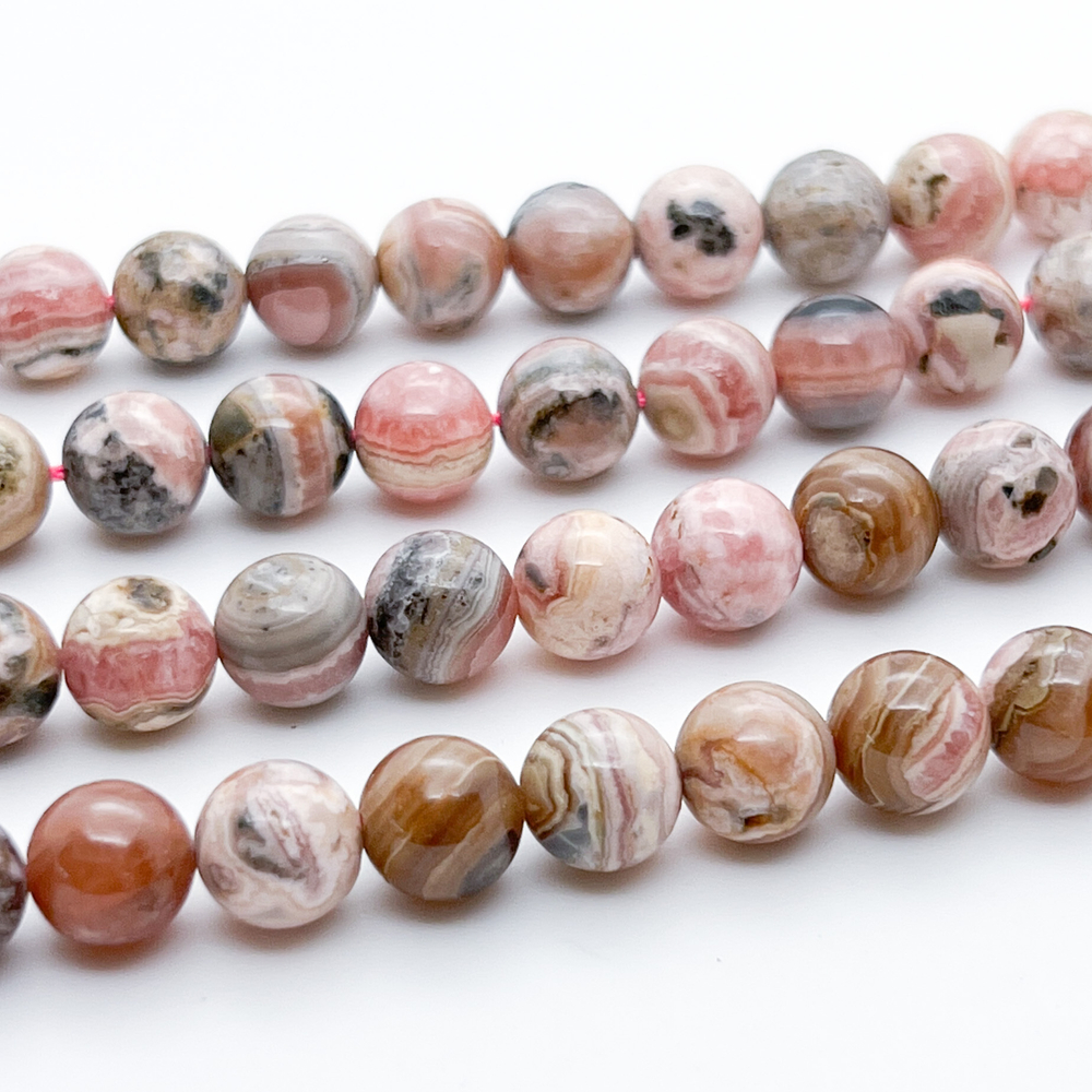 Родохрозит, размер около 8,9-9 мм, цена за 10 шт (1/4 нити)