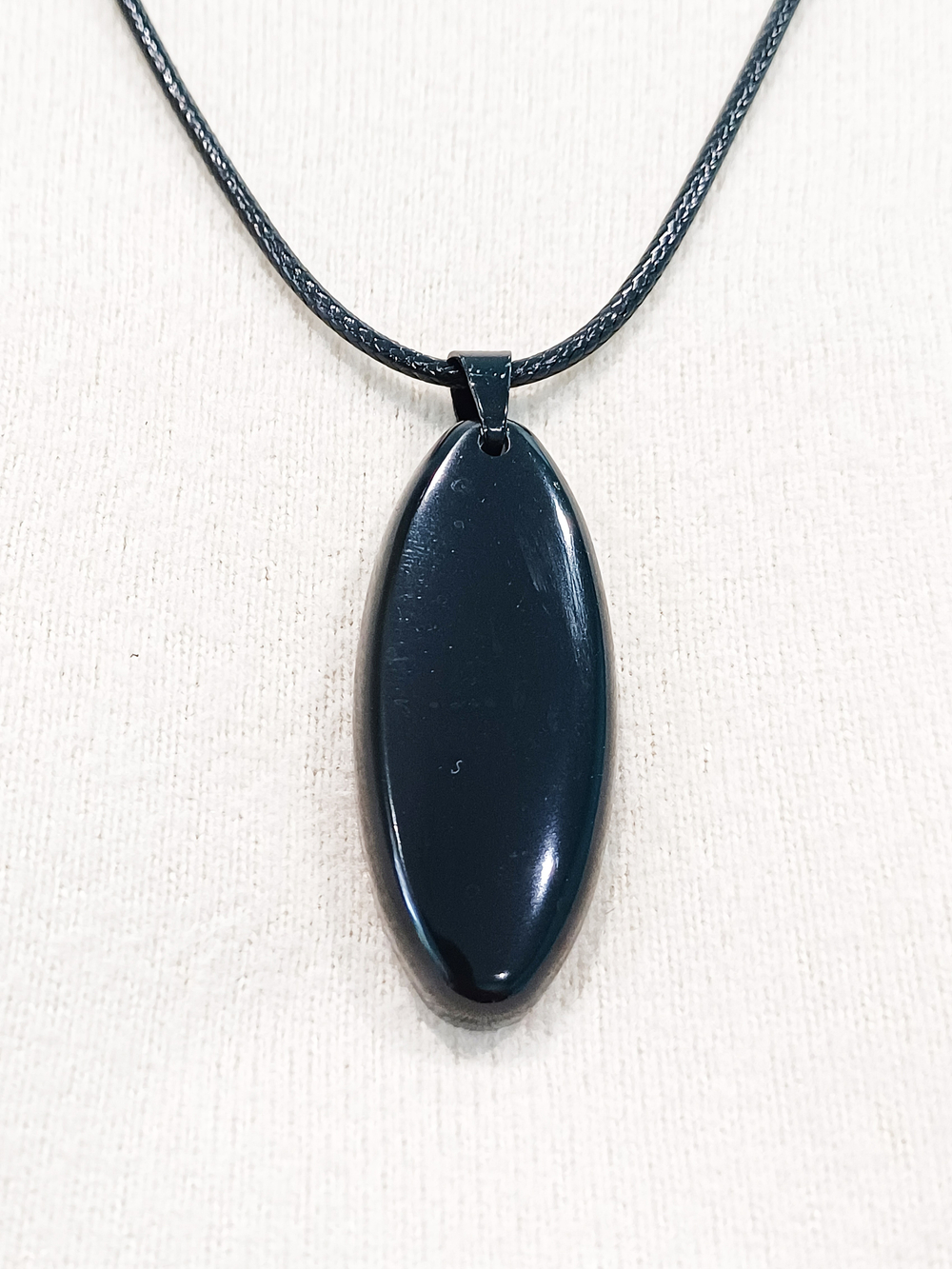 Кулон черный овал