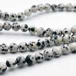 "Далматин" бусины, диаметр около 6,2-6,4 мм, цена за 28-29 шт (1/2 нити)