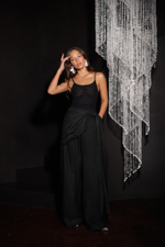 Брюки в полоску с драпировкой