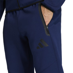 Мужские теннисные штаны Adidas Tiro 26 Travel Sweat - tena blue