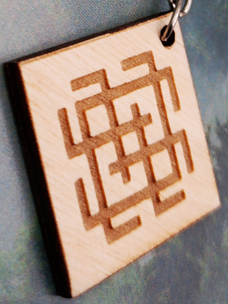 Брелок из дерева Белобог