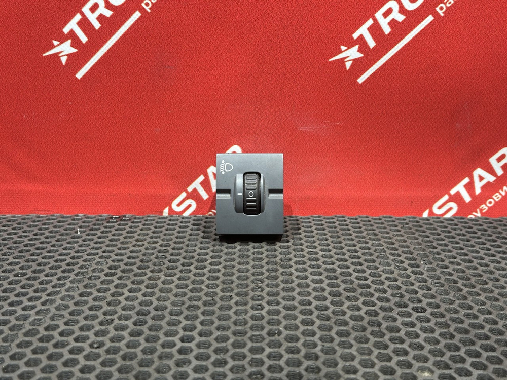 Переключатель регулировки света фар