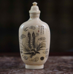 Китайская табакерка из слоновой кости с изображением птицы Феникс — Фэнхуан