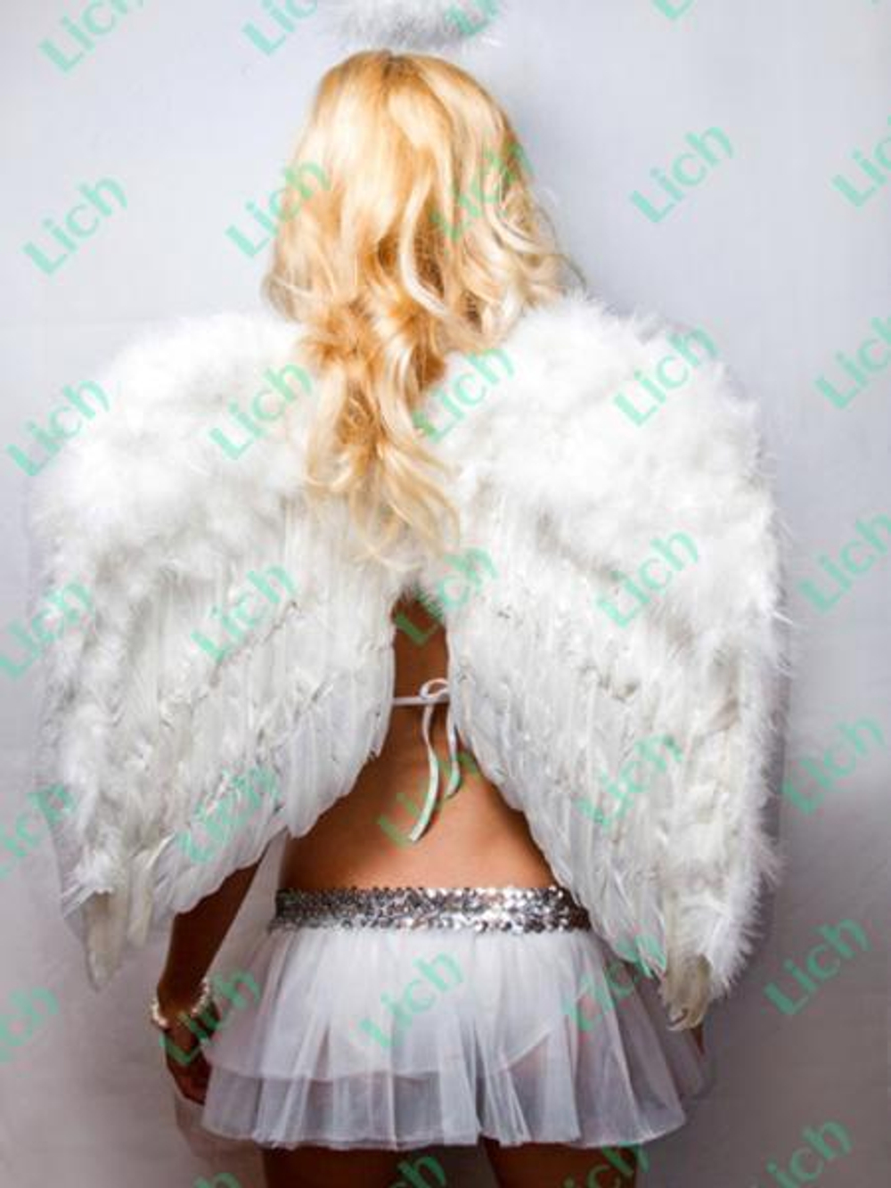 Крылья перьевые белые 60х50см