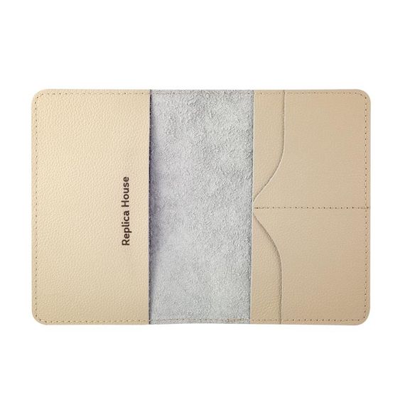 Фотография обложки для паспорта с изображением Белка с орехом из зернистой кожи молочного цвета на белом фоне в полном развороте без наполнения.